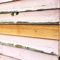 peeling-exterior-paint-of-a-suburban-home-2026-07-15-21-35-16-utc